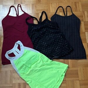 Lots of Lululemon tank tops fit size 2 4